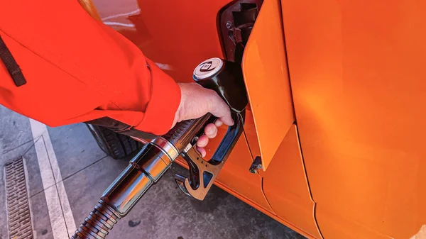Man Hand Filling Tank His Vehicle Gas Station Hose — стоковое фото