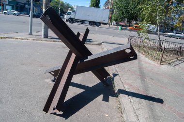 Anti-tank hedgehog on the street of the Ukrainian city.