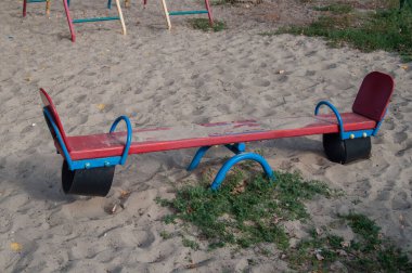 Children's double swing for a fun game in pairs