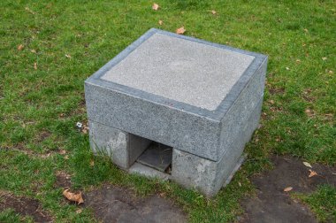 Concrete chair for recreation in open air.