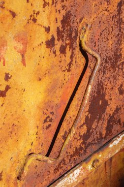 Door handle on the gate of an old metal garage