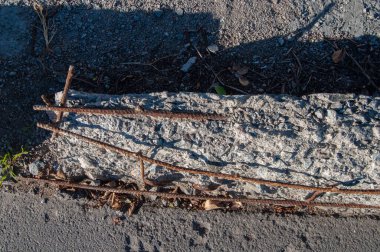 Section of the Destroyed Concrete Structure with Bare Reinforcement