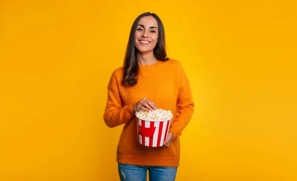 Favorite Film Happy Young Attractive Brunette Woman Yellow Sweater While — Stockfoto