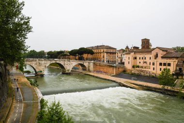 Tiberina Island and Ponte Cestio (Pons Cestius) on Tevere, Rome, Italy