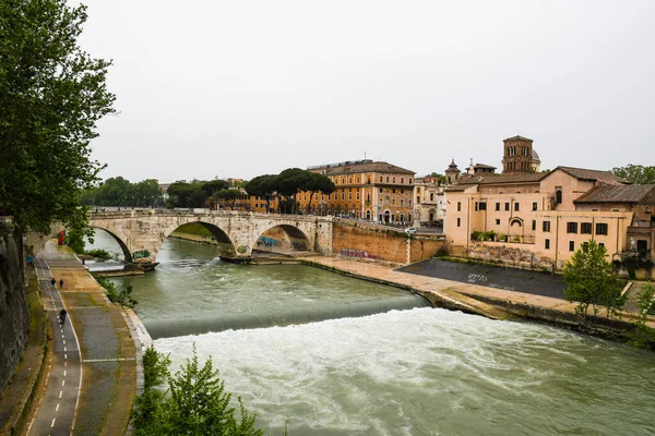 Tiberina Island and Ponte Cestio (Pons Cestius) on Tevere, Rome, Italy