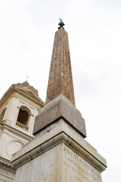 Ancient ruins in Rome (Italy) - Obelisk (Obelisco Sallustiano) and Church (Trinit dei Monti) at the top of Spanish Steps