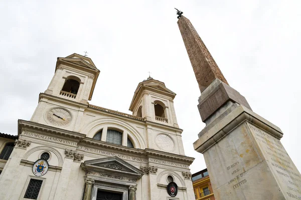 Ancient ruins in Rome (Italy) - Obelisk (Obelisco Sallustiano) and Church (Trinit dei Monti) at the top of Spanish Steps