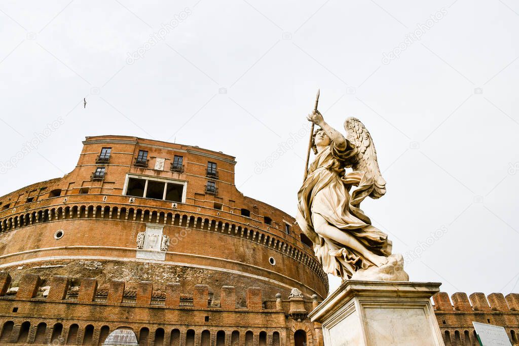 Ancient ruins in Rome (Italy) - Statues of angel on Ponte Sant'Angelo and Castel Sant'Angelo