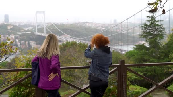 Turkish Women Looking Istanbul Skyline Fatih Sultan Mehmet Bridge Also — Stockvideo
