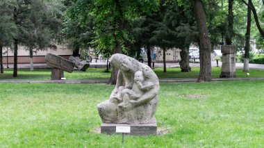 Bishkek, Kyrgyzstan - May 2022: Bishkek city park full of statues and sculptures by various artists. City Park is a popular destination for the local Kyrgyz people.