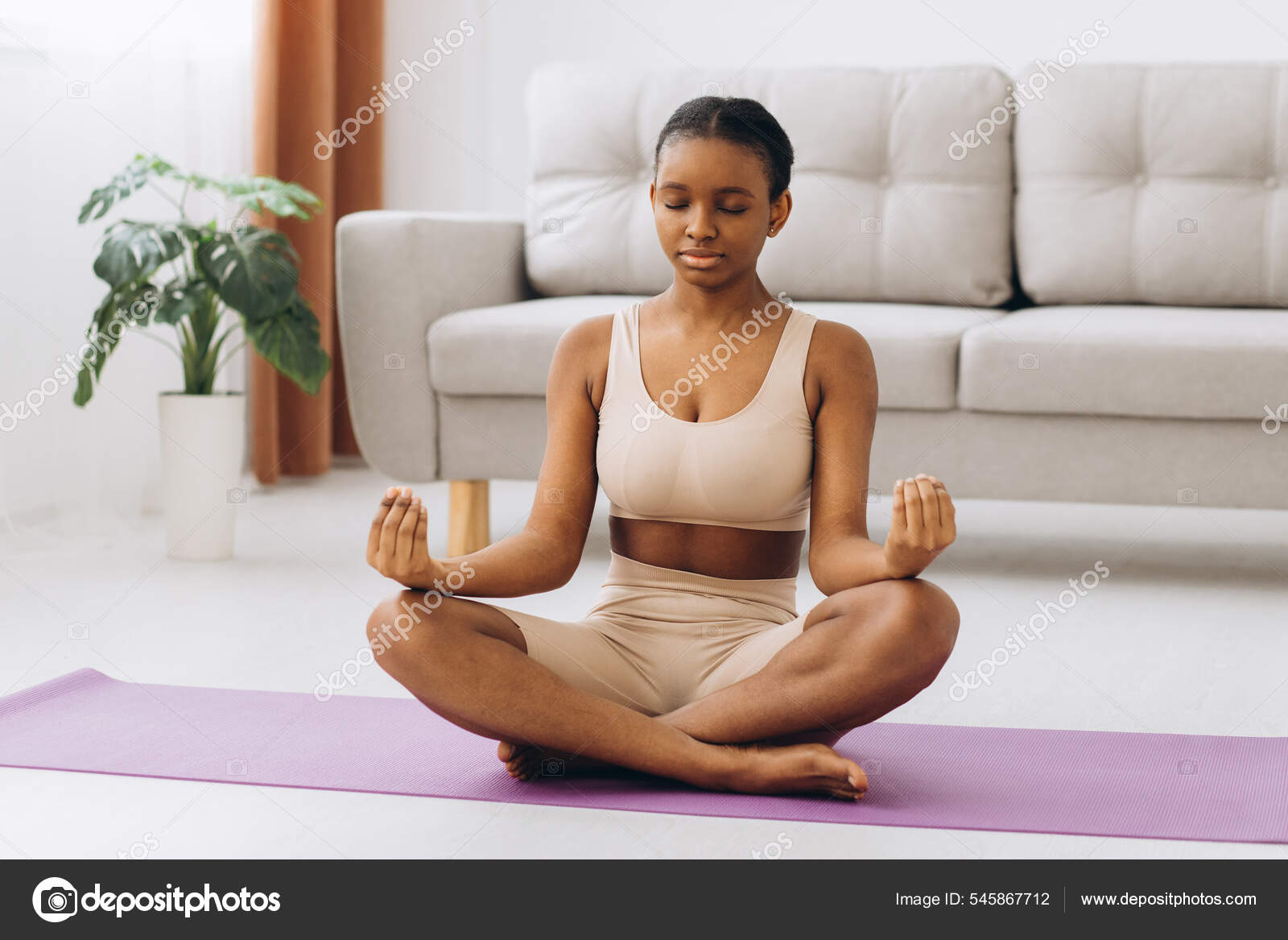 https://st.depositphotos.com/9045224/54586/i/1600/depositphotos_545867712-stock-photo-young-black-woman-meditating-home.jpg