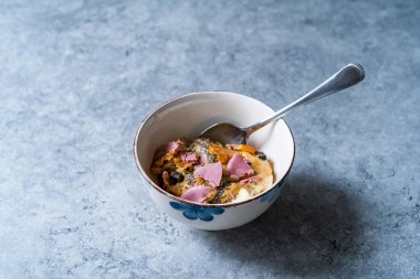Porridge with Ruby Chocolate, Candied Orange Slices and Chia Seeds. Ready to Eat.