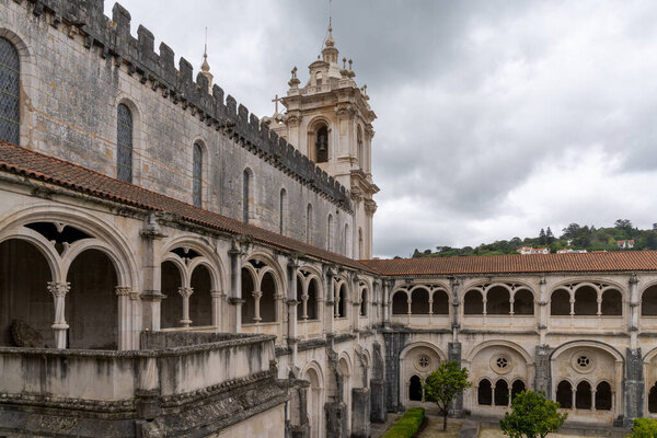 Alcobaca, Portugal - 7 April, 2022: cloister and church of the Alcobaca monastery