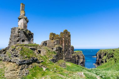 Wick, United Kingdom - 26 June, 2022: view of the Caithness coast and the ruins of the historic Castle Sinclair Girnigoe clipart