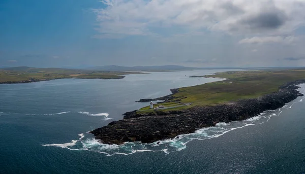 A drone panorama landscape of Boradhaven Bay and the hsitoric Broadhaven Lighthouse on Gubbacashel Point