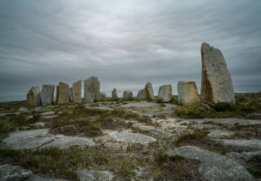 A long exposure view of the historic megalith site of Tobar Dherbhile on the Mullet Peninsula of County Mayo in Ireland