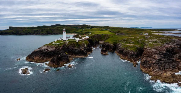A panorama drone landscape view of Fanad Head Lighthouse and Peninsula on the northern coast of Ireland
