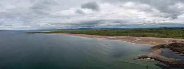 drone panorama landscape of Doughmore Bay and Beach in County Clare in western Ireland