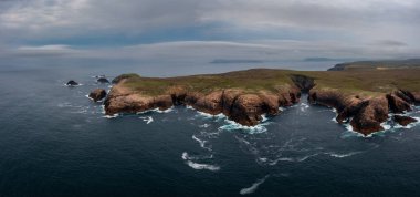A panorama landscape of the cliffs and wild coast of Erris Head on the northern tip of the Mullet Peninsula in County Mayo of Ireland