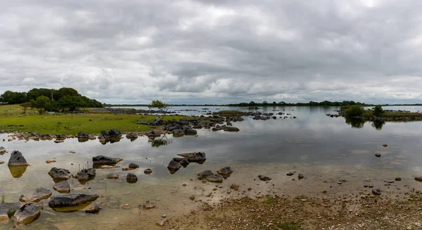 calm and peaceful panorama landscape of the idyllic Lough Corrib lake in County Galway