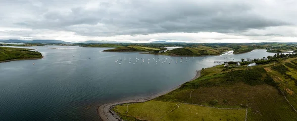 drone panorama landscape of Rosmoney Pier and marina and the drumlin islands of Clew Bay