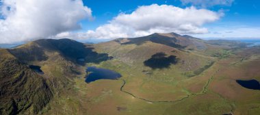A panorama aerial view of the Mountains of the Central Dingle Peninsula and Connor Pass in County Kerry of Ireland