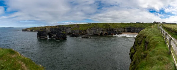 panorama landscape of the Ballybunion Cliff Walk and rugged cliffs and seashore in County Kerry in western Ireland