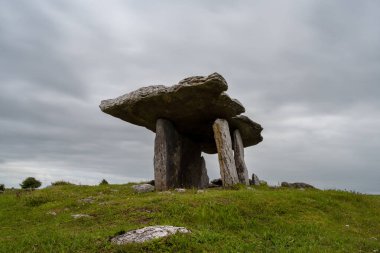 A long exposure view of the Poulnabrone Dolmen under an overcast sky in County Clare of Western Ireland