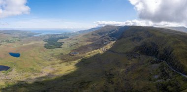 A panorama aerial view of the Mountains of the Central Dingle Peninsula and Connor Pass in County Kerry of Ireland
