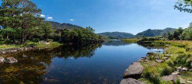 A panorama landscape of the Meeting of the Waters in Killarney National Park on the Ring of Kerry