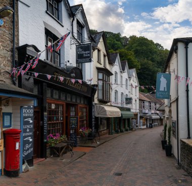 Lynton and Lynmouth, united Kingdom - 2 September, 2022: village center with colorful buildings and shops in the picturesque village of Lynmouth in North Devon