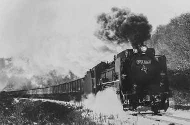 Old black and white photo of Japanese steam locomotive D51