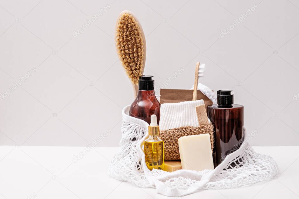 eco natural cosmetics, organic skin care products in cotton bag on white background, eco-shopping concept, copy space