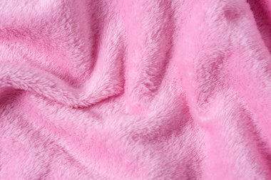Üst görünüm pembe kabarık ekose arka plan, kıvrımlı, örülmüş yüzey
