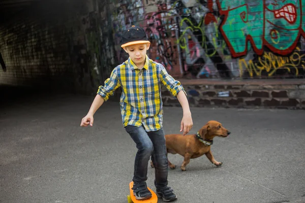 Boy Walks Town Dog Active Games Children Child Rides Skateboard — Stock Photo, Image