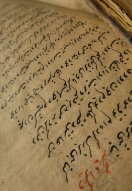 Taşkent, Özbekistan - 10 Ağustos 2009: Arapça antik açık kitap. Eski Arapça el yazmaları ve metinler
