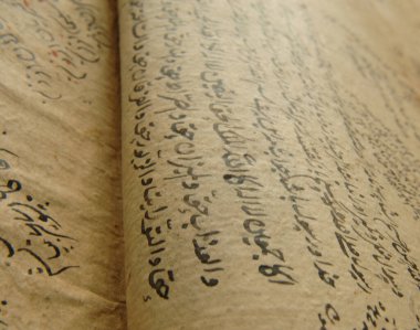 Taşkent, Özbekistan - 10 Ağustos 2009: Arapça antik açık kitap. Eski Arapça el yazmaları ve metinler