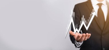 Elde tutulan satış verileri ve ekonomik büyüme grafiği. İş planlama ve strateji. Takas ticareti analiz ediliyor. Finansal ve bankacılık. Teknoloji dijital pazarlama. Kâr ve büyüyen plan.