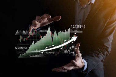 Elde tutulan satış verileri ve ekonomik büyüme grafiği. İş planlama ve strateji. Takas ticareti analiz ediliyor. Finansal ve bankacılık. Teknoloji dijital pazarlama. Kâr ve büyüyen plan.