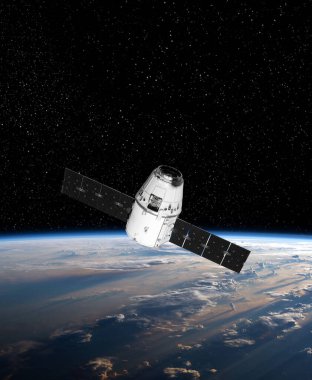 Kargo uzay aracı Dünya gezegeni. Karanlık arka plan. Bilim kurgu duvar kağıdı. Uzay İstasyonu Dünya 'nın yörüngesindeki uzay gemisi. Uzay sanat duvar kağıdı. Güneş Gözlemevi. Bu görüntünün unsurları NASA3D illüstrasyon tarafından desteklenmektedir..