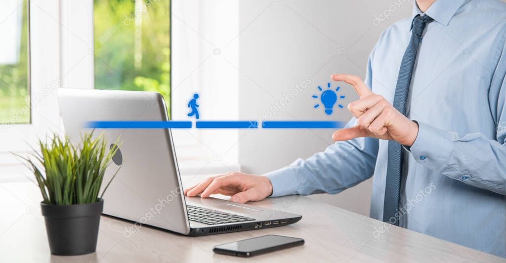 Male business man hand hold a connecting block between two sets of bridge road for a silhouetted man to walk idea icon