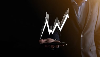 Elde tutulan satış verileri ve ekonomik büyüme grafiği. İş planlama ve strateji. Takas ticareti analiz ediliyor. Finansal ve bankacılık. Teknoloji dijital pazarlama. Kâr ve büyüyen plan.