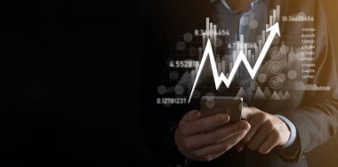 Elde tutulan satış verileri ve ekonomik büyüme grafiği. İş planlama ve strateji. Takas ticareti analiz ediliyor. Finansal ve bankacılık. Teknoloji dijital pazarlama. Kâr ve büyüyen plan.