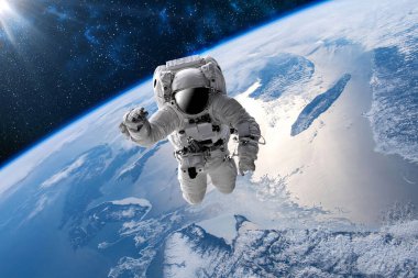 Dünya 'nın dış uzayındaki astronot. Yıldızlar arka planı sağlar. Dünya' nın üzerinde bir uzay oluşturur. Bu görüntünün ISS elementleri NASA tarafından desteklenmektedir.