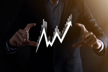 Elde tutulan satış verileri ve ekonomik büyüme grafiği. İş planlama ve strateji. Takas ticareti analiz ediliyor. Finansal ve bankacılık. Teknoloji dijital pazarlama. Kâr ve büyüyen plan.