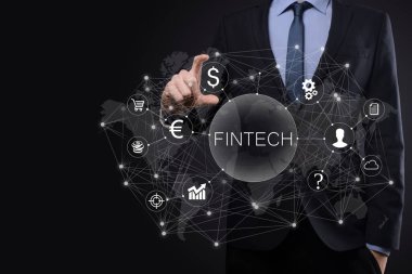 Fintech-Finansal Teknoloji konsepti işadamında. Yatırım bankacılığı ödemesi. Kripto para yatırımı ve dijital para. Sanal ekranda iş kavramı