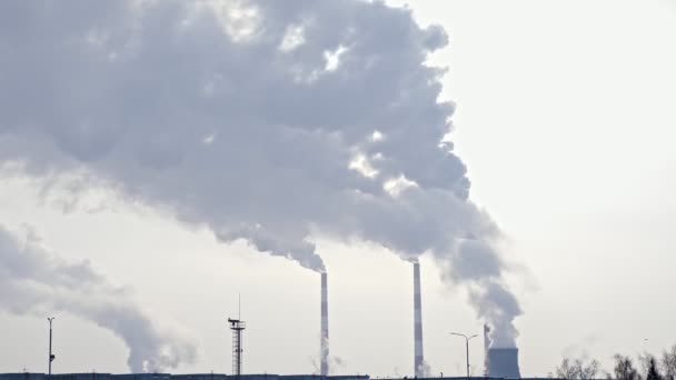 White smoke from the chimneys of a thermal power plant, slow motion — Stock Video