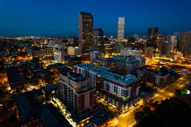 aerial shot modern city with skyscrapers in evening