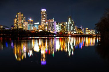 aerial shot modern city with skyscrapers in evening
