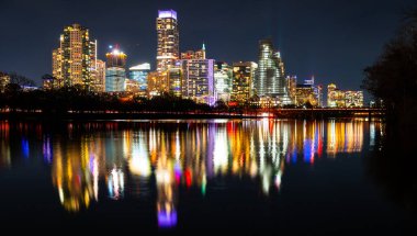 aerial shot modern city with skyscrapers in evening